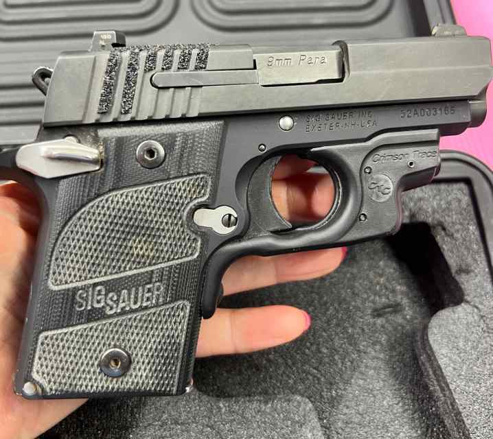 Sig Sauer P938 Nightmare 9mm with added Crimson Tr