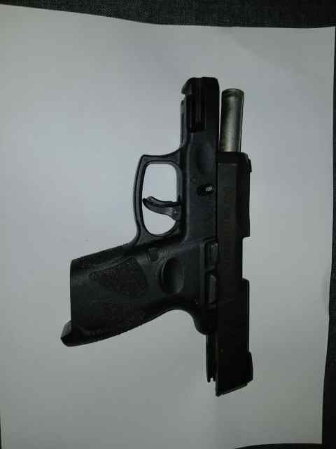 Taurus PT111 G2 Millennium 9mm w/ ArmaLaser TR12